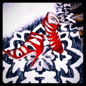 Red Stiletto, 4” heel with ankle strap, like new.